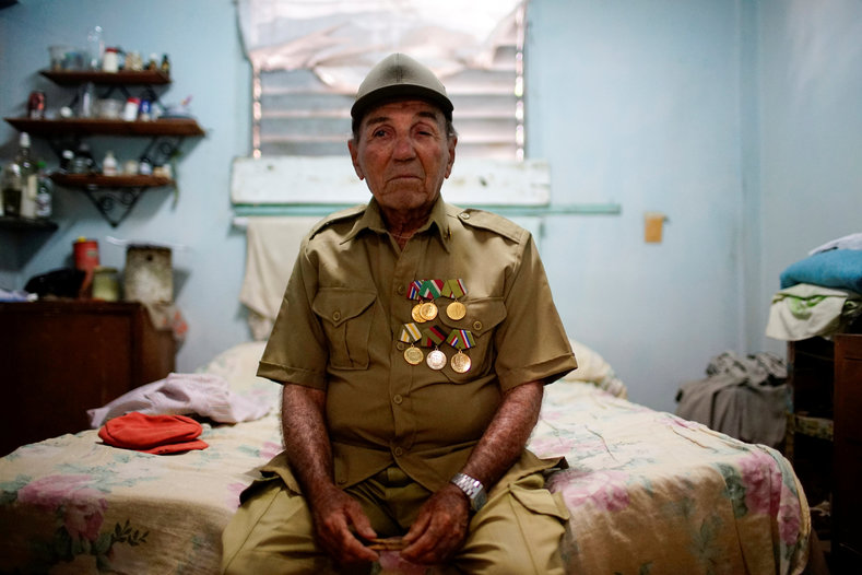 Former rebel Nelson Alvarez, 85, in his home in El Cobre. Speaking of the revolution, Alvarez said: 