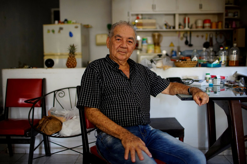 Former rebel Aldana Suarez, 76, at home in Havana. The generation that lived through the original revolution is now witnessing changes in society as a younger generation, that has never lived anything but the revolution and doesn't remember what it was like before, takes leadership.