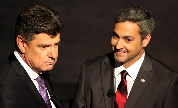 The opposition candidate Efrain Alegre (l) and the ruling party's candidate Mario Abdo Benitez (r) in the only debate before the presidential elections in Asuncion, Paraguay. April 15, 2018.