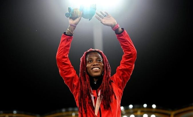 Michelle-Lee Ahye celebrates her gold medal victory at the 2018 Commonwealth Games.