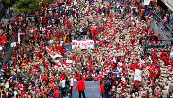Venezuela's President Nicolas Maduro greets supporters during a rally in Caracas, Venezuela April 14, 2018.