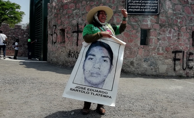 A mother of one of the kidnapped students protests in front of the military barracks in Chilpancingo, Guerrero. April 20, 2018.