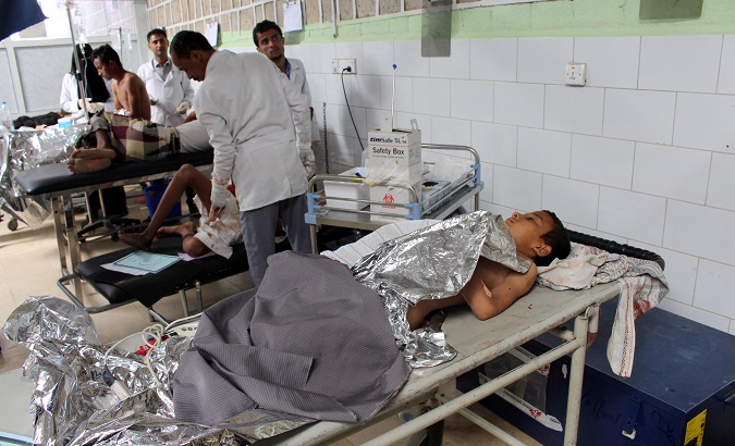 Doctors attend to people injured by air strikes while attending a wedding in a village in northwestern Yemen, at a hospital in Hajjah, Yemen April 23, 2018.
