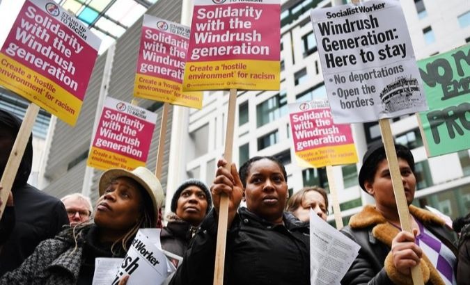 People protest in favor of Windrush generation residents in Britain.