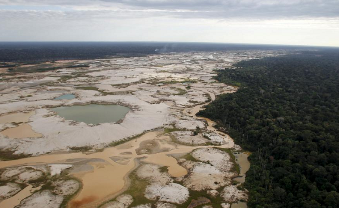 An area deforested by illegal gold mining is seen in a zone known as Mega 14, in the southern Amazon region of Madre de Dios, Peru, July 13, 2015.