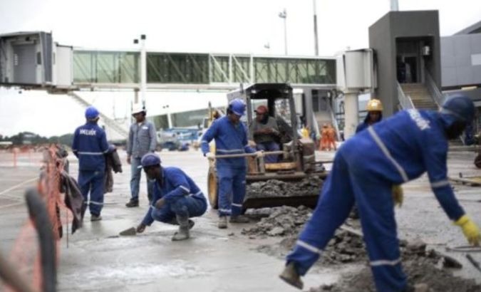Workers renovate Juscelino Kubitschek International Airport in Brasilia, Brazil.