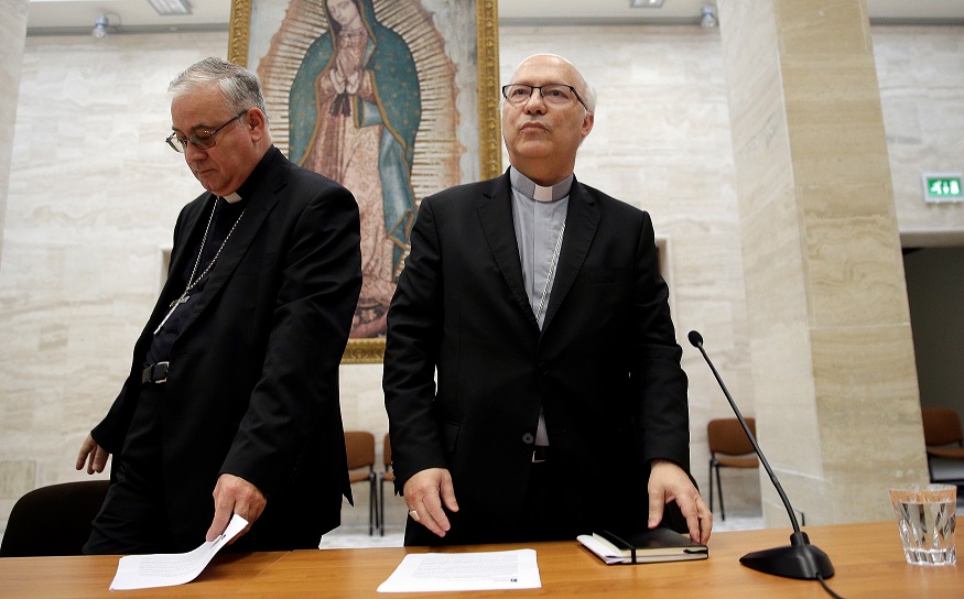Chilean bishops Luis Fernando Ramos Perez and Juan Ignacio Gonzalez Errazuriz arrive for a news conference after a meeting with Pope Francis at the Vatican, May 18, 2018.