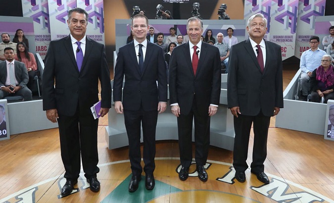 Independent candidate Jaime Rodriguez Calderon, Ricardo Anaya, Jose Antonio Meade and Lopez Obrador pose for a photo in their second televised debate in Tijuana, Mexico in this May 20, 2018