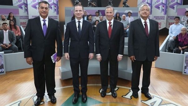 Independent candidate Jaime Rodriguez Calderon, Ricardo Anaya, Jose Antonio Meade and Lopez Obrador pose for a photo in their second televised debate in Tijuana, Mexico in this May 20, 2018