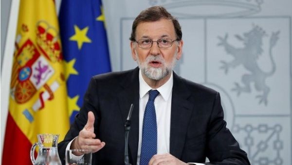 Prime Minister Mariano Rajoy said he would fight off the no-confidence vote and serve his four-year term.