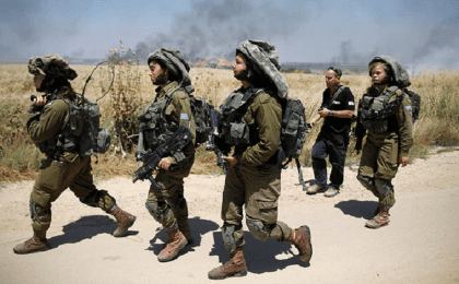  Israeli soldiers patrol the border with Gaza where there were violent clashes earlier this month. 