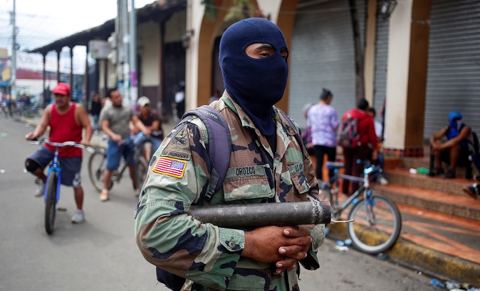 An anti-government protester armed with a mortar during a recent riot in Nicaragua.