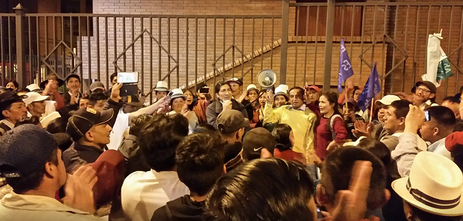 Activists celebrate around Yaku Perez, Ecuarunari president, on Friday night in Cuenca after a judge ruled to suspend mining activities at the Junefield Rio Blanco site.