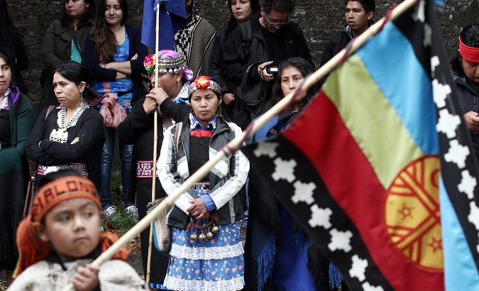 A group of Mapuche protest outside of the tribunal were Celestino Cordova was being judged in Temucho, Chile. February 3, 2014.