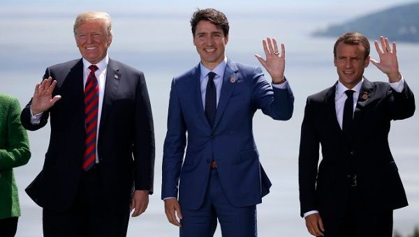 U.S. President Donald Trump with Canada's Prime Minister Justin Trudeau and French President Emmanuel Macron at the G7 meeting.