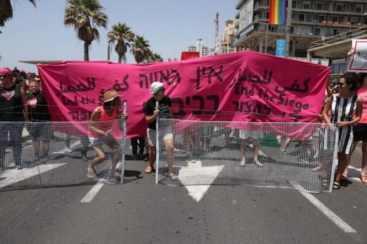 The demonstrators say that the Israeli government is exploiting the LGBTQ community to present itself as liberal while violating the rights of Palestinians.