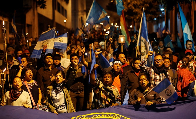 Demonstrators take part in a protest against the Guatemalan government's disaster agency, in Guatemala City, Guatemala June 9, 2018.