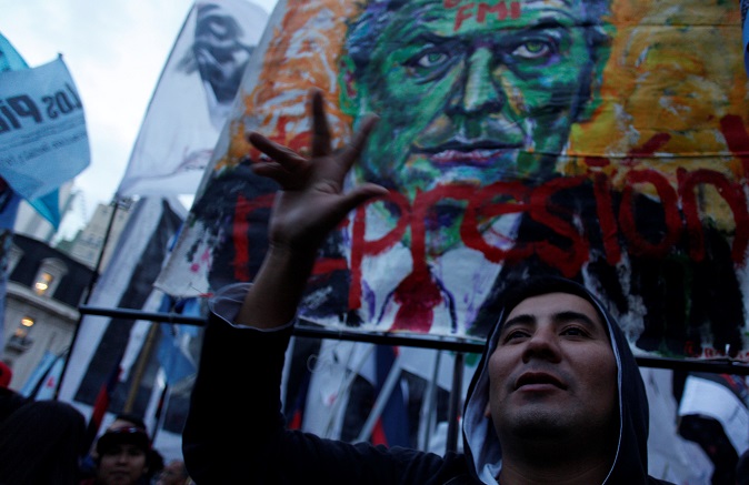 A demonstrator shouts slogans during a protest against the economic measures taken by Argentine President Mauricio Macri's government in Buenos Aires, Argentina May 17, 2018.