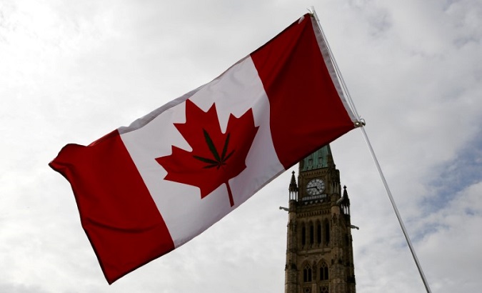 A Canadian flag with a marijuana leaf on it is seen during the annual 4/20 marijuana rally on Parliament Hill in Ottawa, Ontario, Canada, April 20, 2017