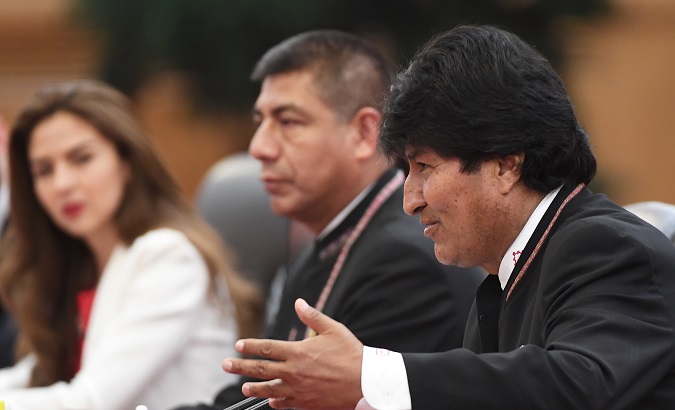 Bolivia's President Evo Morales (R) said: 