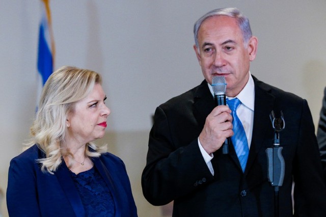 Israeli Prime Minister Benjamin Netanyahu and his wife Sara Netanyahu speak during the opening of a special exhibit on Jewish presence in Jerusalem at the United Nations Headquarters in New York City.