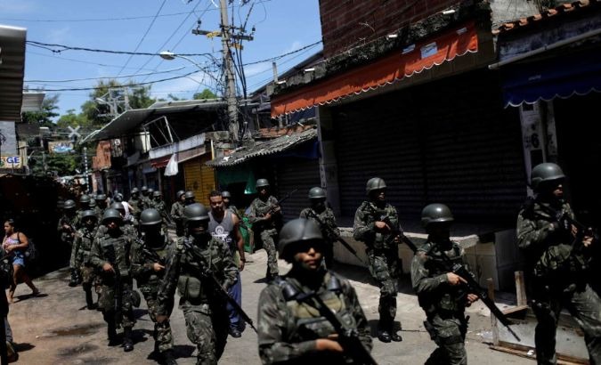 Brazil's armed forces patrol a favela in Rio de Janeiro.