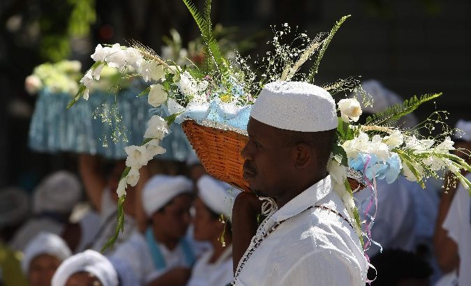 An offering is provided to Iemanja during a Candomble ceremony in Rio de Janeiro, Brazil.
