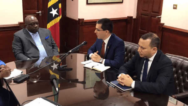 Venezuela's Foreign Minister Arreaza met with the Prime Minister of Saint Kitts and Nevis, Timothy Harris (left-).