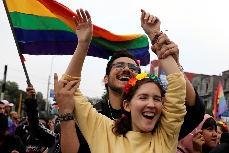Participants attend the annual Gay Pride parade in Lima, Peru, June 30, 2018. 