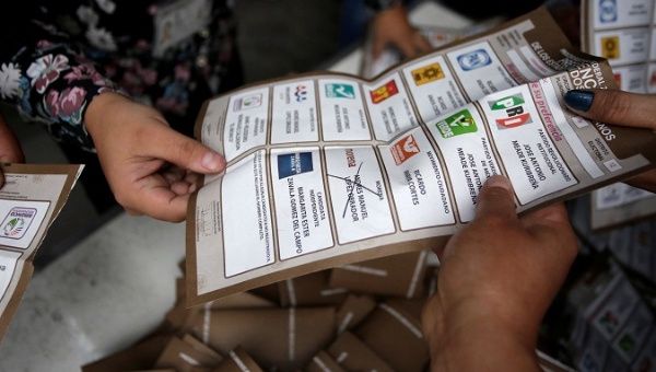 Election officials count ballots after polls closed during presidential election in Mexico City, Mexico July 1, 2018.