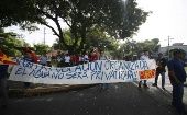 "El agua no se vende: se cuida y se defiende", el lema de las marchas en El Salvador.