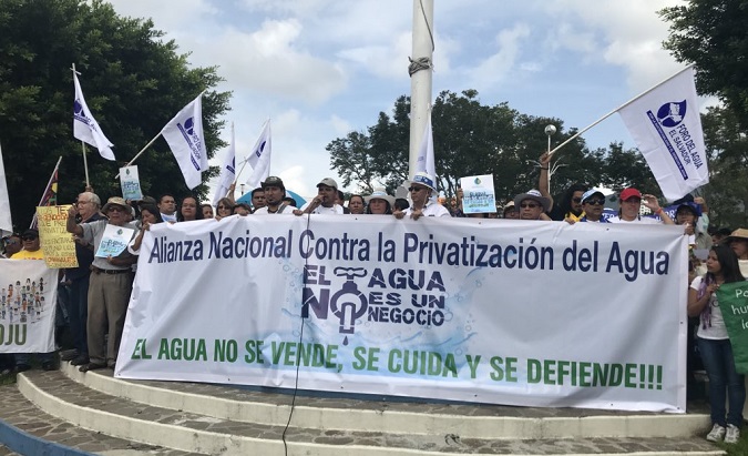 At least 50 organizations and the FMLN, march in the streets of San Salvador demonstrating against water privatization legislation in late June, 2018.