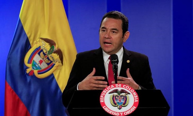 Guatemala's President Jimmy Morales speaks during a news conference in Bogota, Colombia February 23, 2018.