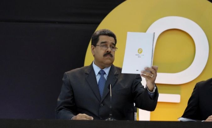 Venezuelan President Nicolas Maduro speaks during the launch of the Petro.