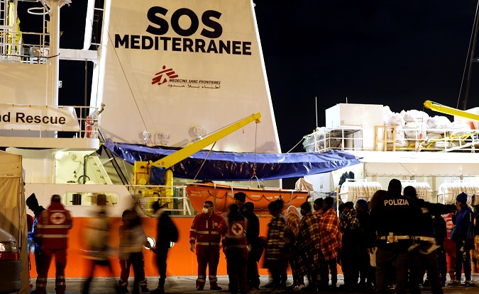 Migrants disembark from the MV Aquarius, a search and rescue ship after it arrived in Augusta on the island of Sicily, Italy, January 30, 2018.