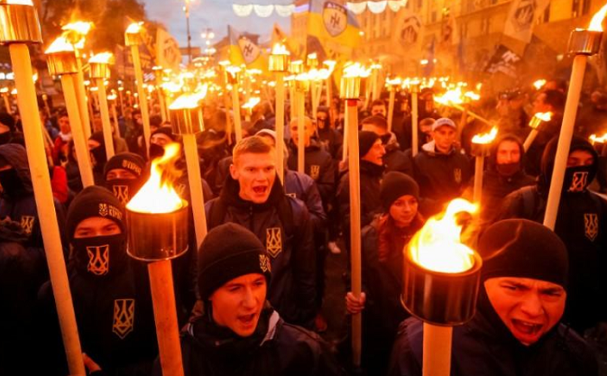 Ukrainian nationalist and far-right groups take part in a rally to mark Defender of Ukraine Day in Kiev, October 14, 2017