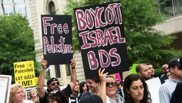 Activists call for boycotting Israel.