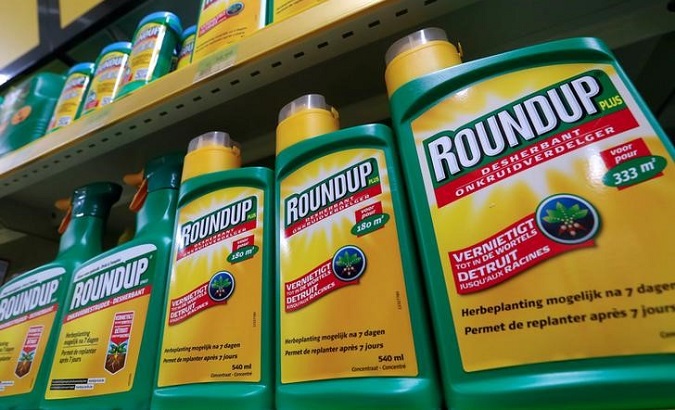 Monsanto's Roundup weedkiller atomizers are displayed for sale at a garden shop near Brussels, Belgium November 27, 2017.