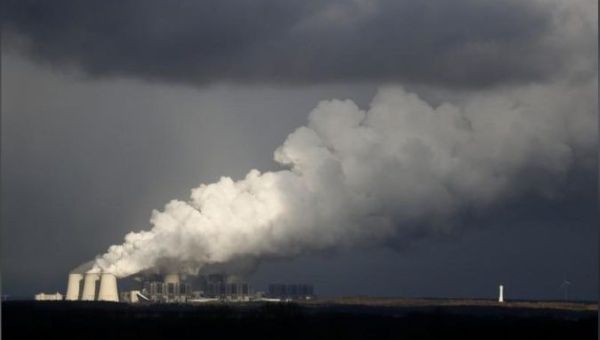 Smoke rises from a coal power plant.