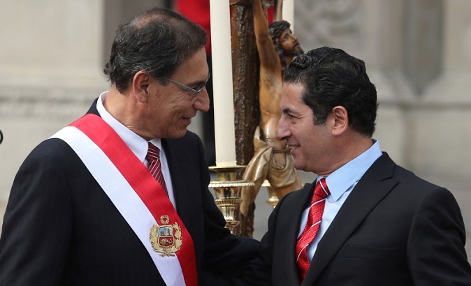 Peru's President Martin Vizcarra and his former Justice Minister Salvador Heresi at Heresi's swearing ceremony at the government palace in Lima, Peru April 2, 2018.