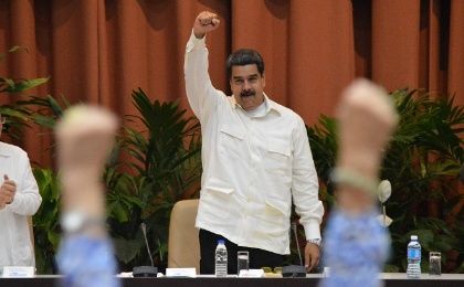 Maduro greets the crowd at the Sao Paulo Forum before his speech in Havana, Cuba. 