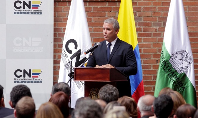 Colombia's President-Elect Ivan Duque addresses the audience after receiving his credentials from the election council, in Bogota, Colombia July 16, 2018