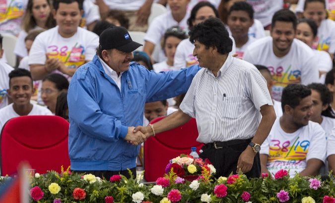 Nicaraguan President Daniel Ortega (L) and Bolivian President Evo Morales (R).
