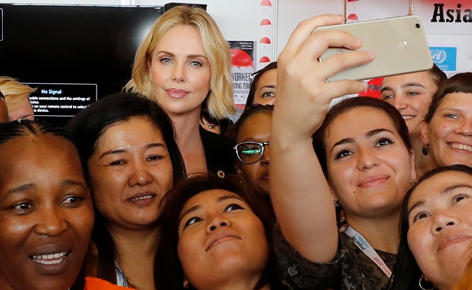 Actress Charlize Theron at the sex workers' networking zone during the International Aids Conference in Amsterdam, July 24, 2018.