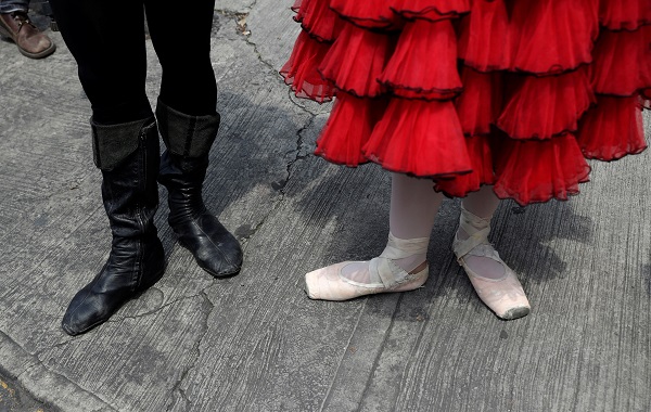 Dressed in tutus and traditional ballet garb, the troupe will perform in public until September 2 to demonstrate the 'Theatricality of Urban Space.'