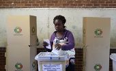 A Zimbabwean woman casts her ballot in the country