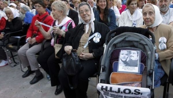 Members of the Mothers of Plaza de Mayo attend the launch of a cultural center in their honor.