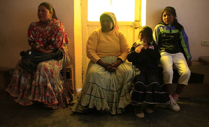 Raramuri people wait for medical attention in Carichi, Chihuahua, in Mexico in this file photo from January 2012.