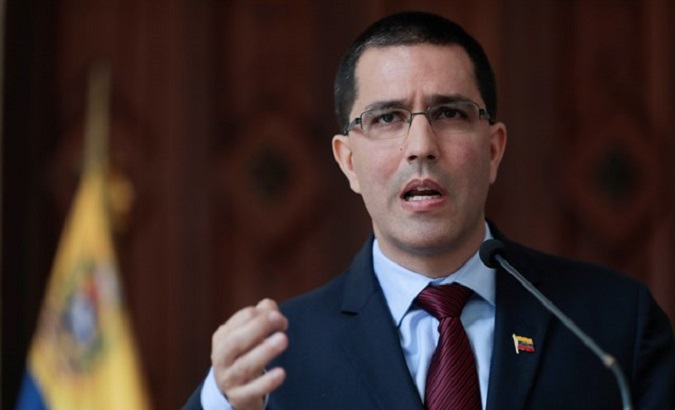 The foreign minister of Venezuela Jorge Arreaza speaks at a news conference.