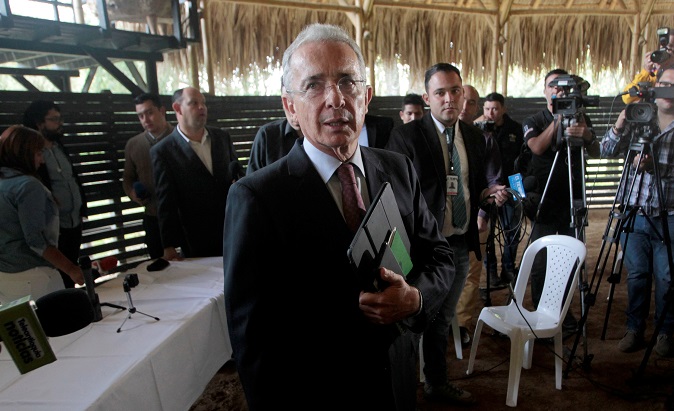 Former Colombian President Alvaro Uribe leaves after addressing the media in Rionegro, Colombia July 30, 2018.
